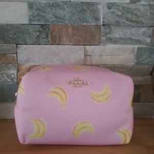 Coach Banana print small cosmetic case.
